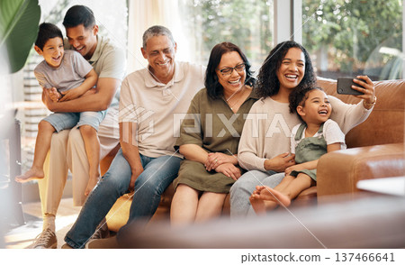 Happy family, selfie and grandparents and children on sofa for holiday, love and relax together at home. Interracial people, mother and father with kids in living room, profile picture or photography Happy family, selfie and grandparents and children on sofa for holiday, love and relax together at home. Interracial people, mother and father with kids in living room, profile picture or photography 137466641