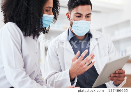 Pharmacy team, research and people on tablet for online prescription order, wellness website and telehealth. Healthcare, pharmaceutical and man and woman with mask on digital tech for consulting app Pharmacy team, research and people on tablet for online prescription order, wellness website and telehealth. Healthcare, pharmaceutical and man and woman with mask on digital tech for consulting app 137466665