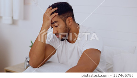 Stress, morning and man in bed with depression problem, insomnia and anxiety alone at home. Mental health, sadness and unhappy male in bedroom depressed, worried and frustrated from sleeping issue Stress, morning and man in bed with depression problem, insomnia and anxiety alone at home. Mental health, sadness and unhappy male in bedroom depressed, worried and frustrated from sleeping issue 137466795