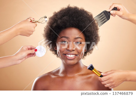 Beauty, tools and portrait of black woman in studio for skincare, haircare and cosmetics. Smile, afro care and happy African model with skin glow, comb and makeup brush on beige background with hands Beauty, tools and portrait of black woman in studio for skincare, haircare and cosmetics. Smile, afro care and happy African model with skin glow, comb and makeup brush on beige background with hands 137466879