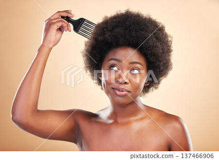 Afro, hair care and black woman in studio with comb for wellness, beauty and salon hairstyle. Haircare, treatment and happy African girl with curls, tools and beige background for luxury spa routine. Afro, hair care and black woman in studio with comb for wellness, beauty and salon hairstyle. Haircare, treatment and happy African girl with curls, tools and beige background for luxury spa routine. 137466906