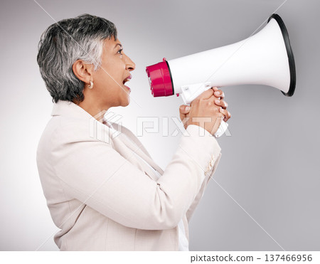 Business woman, megaphone and protest, voice or news and broadcast or announcement on a white background. Mature person, leader or speaker for noise, call to action and attention or warning in studio Business woman, megaphone and protest, voice or news and broadcast or announcement on a white background. Mature person, leader or speaker for noise, call to action and attention or warning in studio 137466956