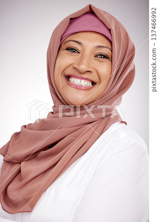 Woman, muslim and face or happy portrait in hijab for fashion, culture and religion on a white background. Islamic or arabic person from Saudi Arabia and clothes, style or smile with faith in studio Woman, muslim and face or happy portrait in hijab for fashion, culture and religion on a white background. Islamic or arabic person from Saudi Arabia and clothes, style or smile with faith in studio 137466992