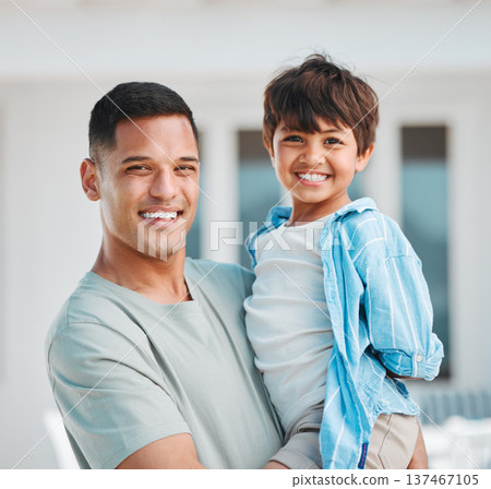 Happy, smile and portrait of a father with his child for bonding time outdoor together at home. Excited, love and young dad holding his boy kid with a positive attitude for fun at house in Mexico. Happy, smile and portrait of a father with his child for bonding time outdoor together at home. Excited, love and young dad holding his boy kid with a positive attitude for fun at house in Mexico. 137467105