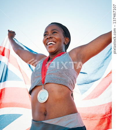 Fitness, winning and black woman with achievement, UK flag and sports with competition, victory and champion. African person, athlete or winner with British symbol, pride and medal with celebration Fitness, winning and black woman with achievement, UK flag and sports with competition, victory and champion. African person, athlete or winner with British symbol, pride and medal with celebration 137467107