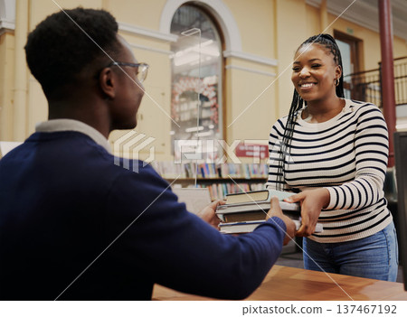 Librarian man, woman and reception for books, learning and knowledge and administration with smile. People, library employee and secretary for study, information and staff at help desk in university 137467192