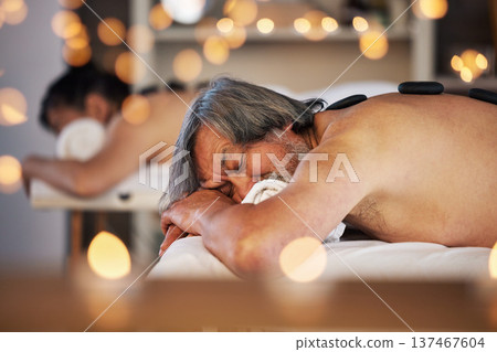 Relax, massage and hot stone with couple in spa for wellness, body treatment and hospitality. Peace, cosmetics and salon with senior man and woman in hotel for health, vacation and physical therapy Relax, massage and hot stone with couple in spa for wellness, body treatment and hospitality. Peace, cosmetics and salon with senior man and woman in hotel for health, vacation and physical therapy 137467604