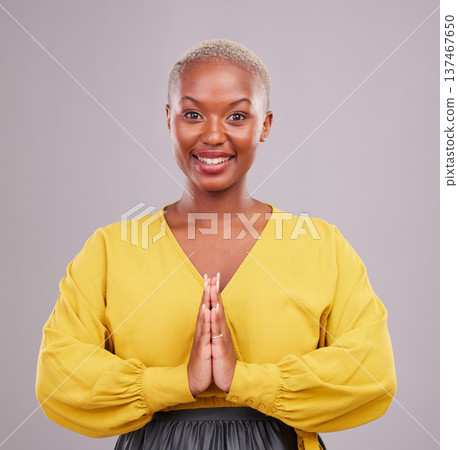Woman, prayer hands and portrait in faith, religion and hope or thank you for career opportunity on studio background. Christian or African person namaste, gratitude emoji and happy for ngo business Woman, prayer hands and portrait in faith, religion and hope or thank you for career opportunity on studio background. Christian or African person namaste, gratitude emoji and happy for ngo business 137467650