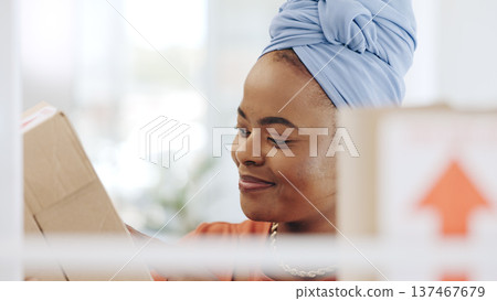Face, box and happy black woman packaging stock product, store delivery or retail distribution shipping. Logistics export, cardboard container and African small business owner working on supply chain Face, box and happy black woman packaging stock product, store delivery or retail distribution shipping. Logistics export, cardboard container and African small business owner working on supply chain 137467679