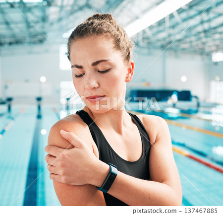 Sports injury, shoulder pain and fitness with woman at swimming pool for medical, training and health. First aid, emergency and accident with person for muscle ache, inflammation and problem 137467885