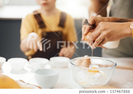 Hands, crack egg and cooking in kitchen on bowl on table with family in home. Food, bakery and break eggshell for ingredient in flour for healthy diet, protein nutrition and preparation of pastry. Hands, crack egg and cooking in kitchen on bowl on table with family in home. Food, bakery and break eggshell for ingredient in flour for healthy diet, protein nutrition and preparation of pastry. 137467888
