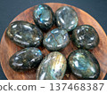 Exquisite collection of labradorite stones showcasing their stunning iridescence. Unique gemstones capture and reflect light 137468387