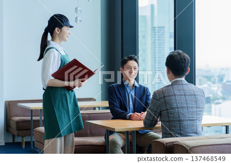 Female staff working at a restaurant Female staff working at a restaurant 137468549