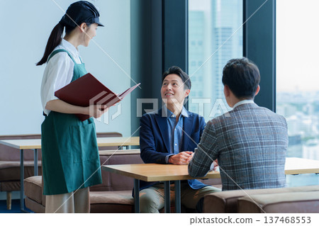 Female staff working at a restaurant Female staff working at a restaurant 137468553