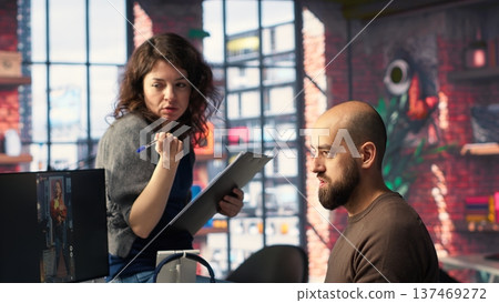 Post production team of experts use software and AI to create content on social media reels, boost marketing and branding while aligning with current media trends and monetization. Camera B. 137469272