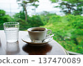 Forest cafe and a cup of hot coffee 137470089