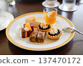 Assorted sweets (orange) 137470172