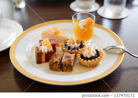 Assorted sweets (orange) Assorted sweets (orange) 137470172