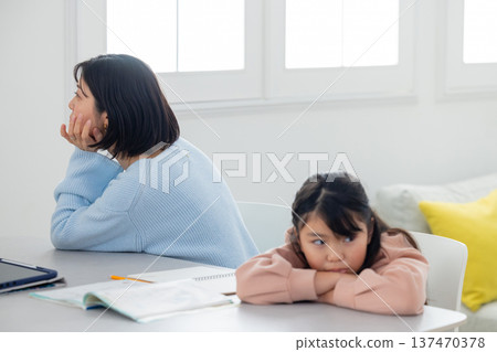 Parents and children fighting over learning Parents and children fighting over learning 137470378