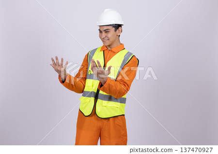 Construction worker shrugging shoulders in doubt Construction worker shrugging shoulders in doubt 137470927