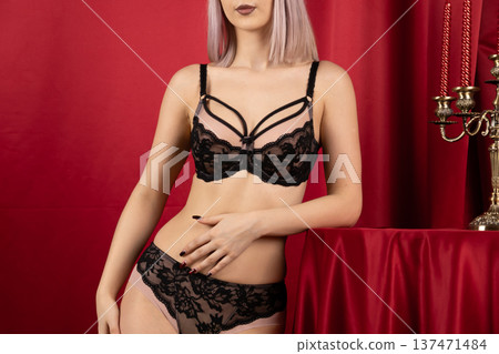 Rear view of a woman in black lace lingerie Rear view of a woman in black lace lingerie 137471484