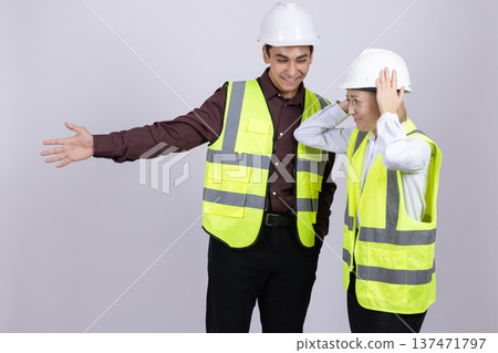 Senior and young engineers working together on building site Senior and young engineers working together on building site 137471797