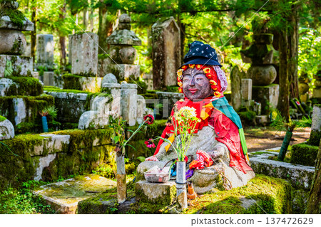 Koyasan Okunoin Temple: Cosmetic Jizo statue on the approach to the temple Koyasan Okunoin Temple: Cosmetic Jizo statue on the approach to the temple 137472629