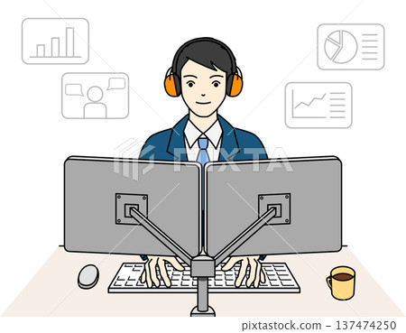 An office scene where a male employee with hearing loss works using earmuffs An office scene where a male employee with hearing loss works using earmuffs 137474250