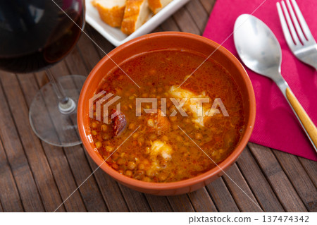 Stewed lentils with sausages, spanish Riojan lentils Stewed lentils with sausages, spanish Riojan lentils 137474342