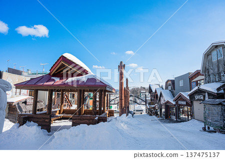 A view of woodcarving folk art and traditional crafts lined up at Ainu Kotan in Akan, Hokkaido 137475137