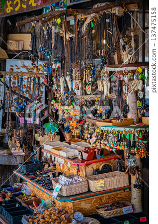 A view of woodcarving folk art and traditional crafts lined up at Ainu Kotan in Akan, Hokkaido A view of woodcarving folk art and traditional crafts lined up at Ainu Kotan in Akan, Hokkaido 137475158