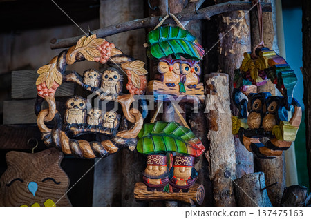 A view of woodcarving folk art and traditional crafts lined up at Ainu Kotan in Akan, Hokkaido A view of woodcarving folk art and traditional crafts lined up at Ainu Kotan in Akan, Hokkaido 137475163