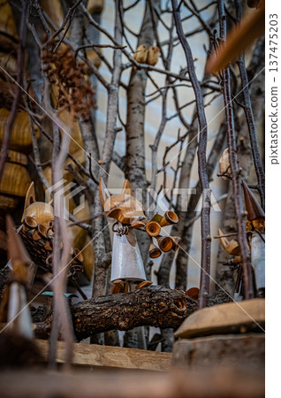 A view of woodcarving folk art and traditional crafts lined up at Ainu Kotan in Akan, Hokkaido 137475203