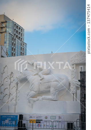 Large snow sculptures at the Sapporo Snow Festival towering under the blue sky (Sapporo, Hokkaido) Large snow sculptures at the Sapporo Snow Festival towering under the blue sky (Sapporo, Hokkaido) 137475414
