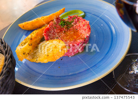 Plate of delicious veal tartar Plate of delicious veal tartar 137475543