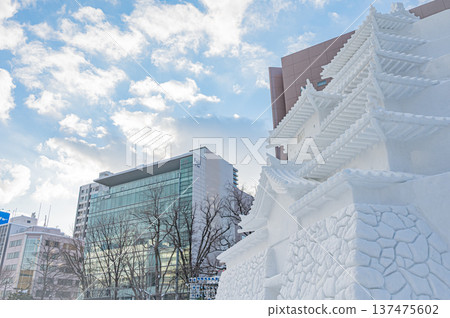 Large snow sculptures at the Sapporo Snow Festival towering under the blue sky (Sapporo, Hokkaido) Large snow sculptures at the Sapporo Snow Festival towering under the blue sky (Sapporo, Hokkaido) 137475602