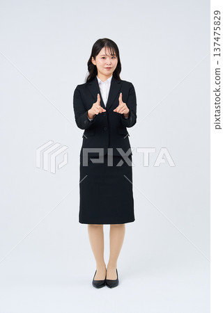 Businesswoman using sign language Businesswoman using sign language 137475829
