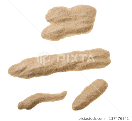 Pile of dry beach sand isolated on a white background, top view. Pile of dry beach sand isolated on a white background, top view. 137476541