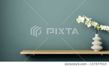 White round pagoda tower flower vase on floated hanging wooden shelf over plain blue green teal wall White round pagoda tower flower vase on floated hanging wooden shelf over plain blue green teal wall 137477414