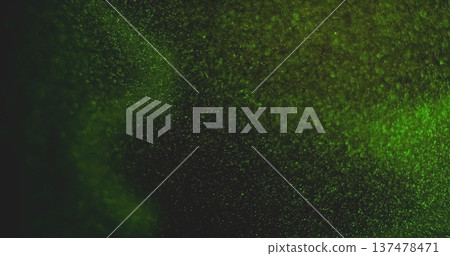 Defocused particles. Green light leak. Glimmer bright color glitter optical bokeh gleam vibrant twinkle on abstract art background. 137478471