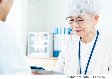 Senior woman receiving consultation 137478728