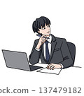 Businessman thinking while working on a laptop 137479182