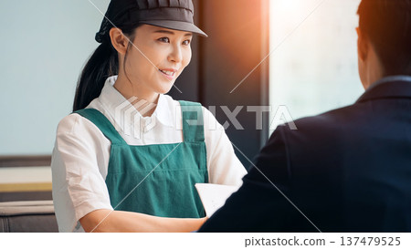 Restaurant employee meeting with consultant Restaurant employee meeting with consultant 137479525