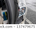 Broken car taillight 137479675