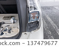 Broken car taillight 137479677