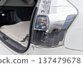Broken car taillight 137479678