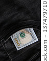 American dollars USD banknotes in jeans pocket. 137479710