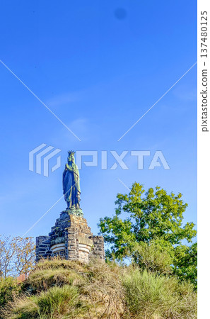Esch-sur-Sure, Wiltz, Grand-Duche de Luxembourg, September 07, 2025, Peaceful statue positioned on 137480125