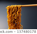 Close-up of instant yakisoba noodles being lifted by chopsticks 137480178