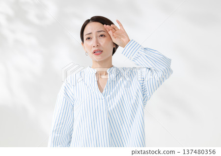 A woman who is not feeling well A woman who is not feeling well 137480356